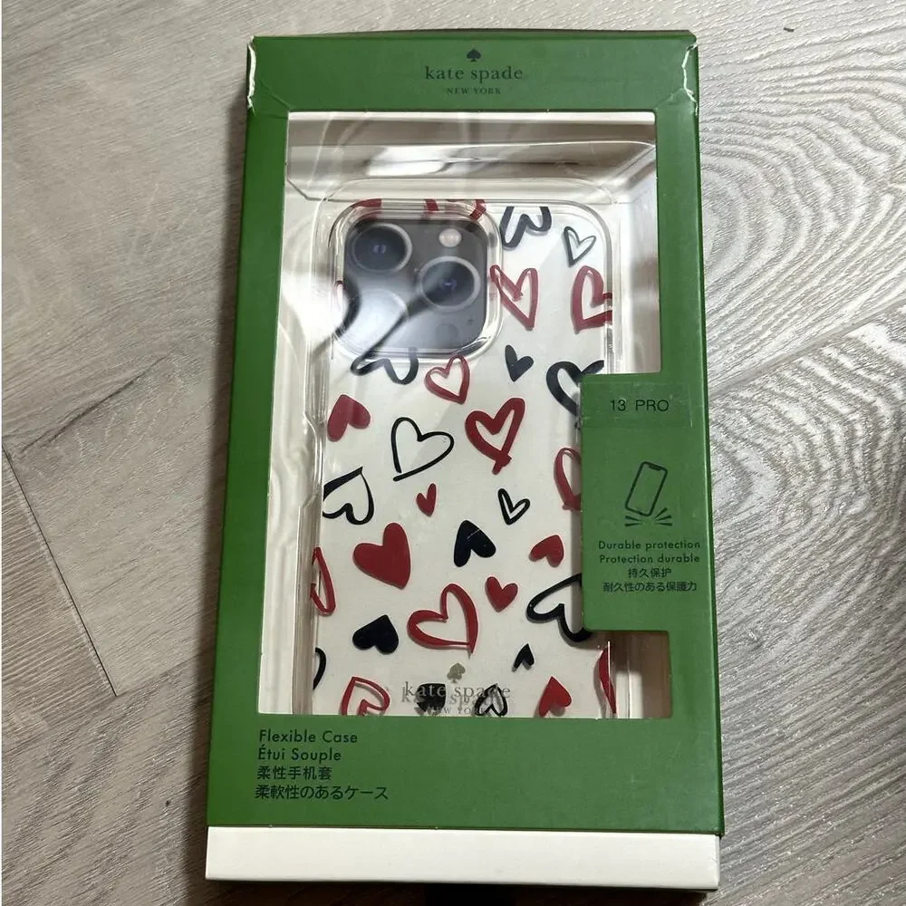 Kate Spade Hearts Clear Resin iPhone 13 Pro Case - Damage box